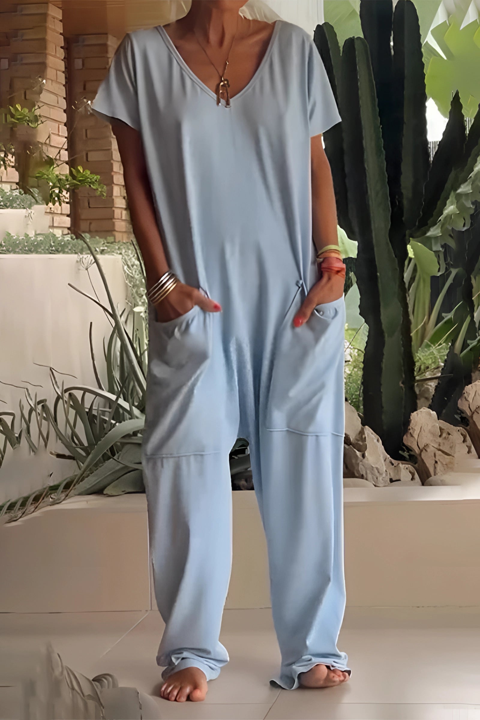 White Boho Chic V-Neck Cotton Oversized Jumpsuit with Pockets, Blue Color, Size 5XL, featuring a relaxed fit, sleeves, and a fashion-forward design.
