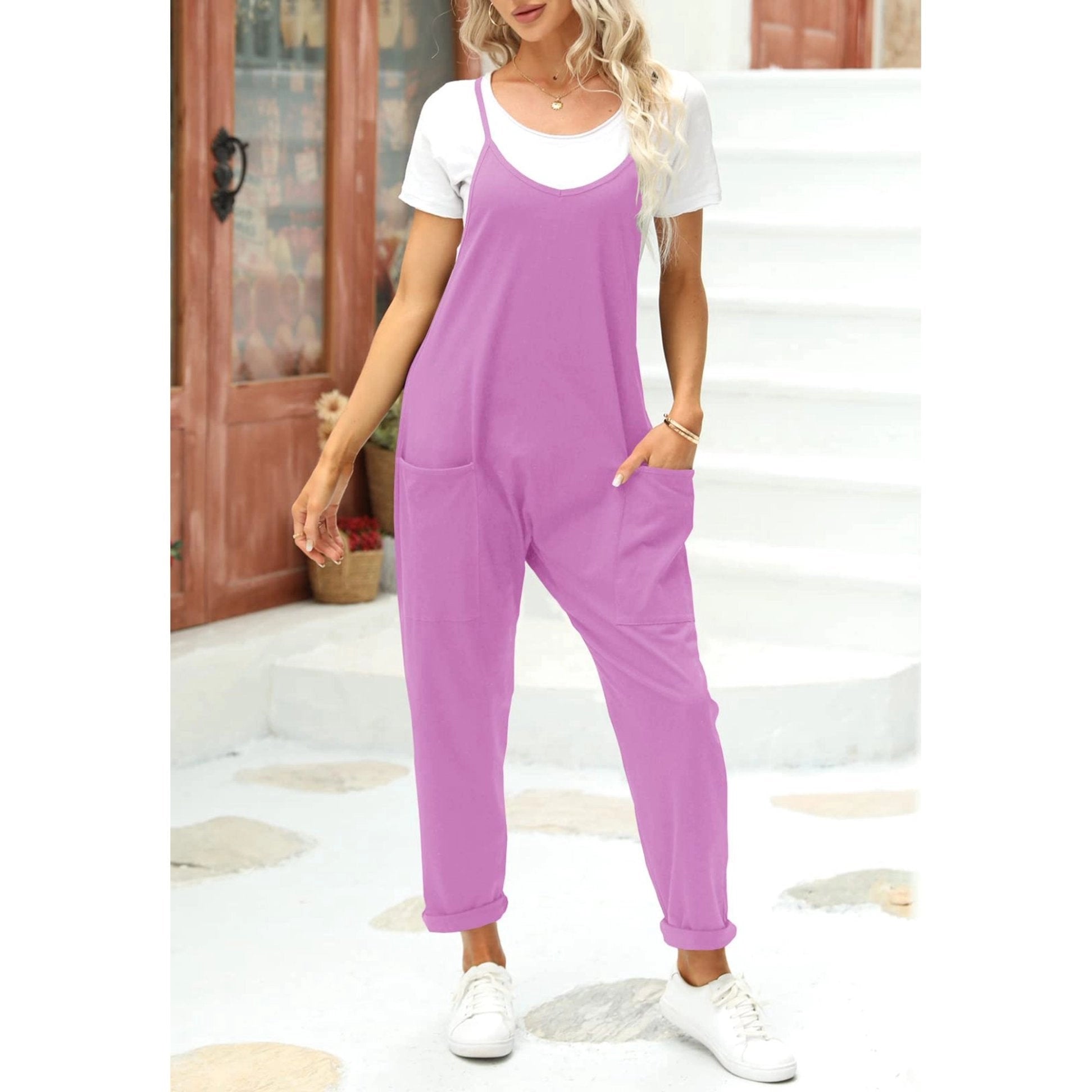 Women's camel sleeveless loose-fit jumpsuit, lightweight summer overalls, showcasing relaxed fit with bare arms and legs.