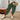 Woman wearing green 2XL linen jogger pants, standing, showcasing the soft, lightweight, and eco-friendly beige fabric.